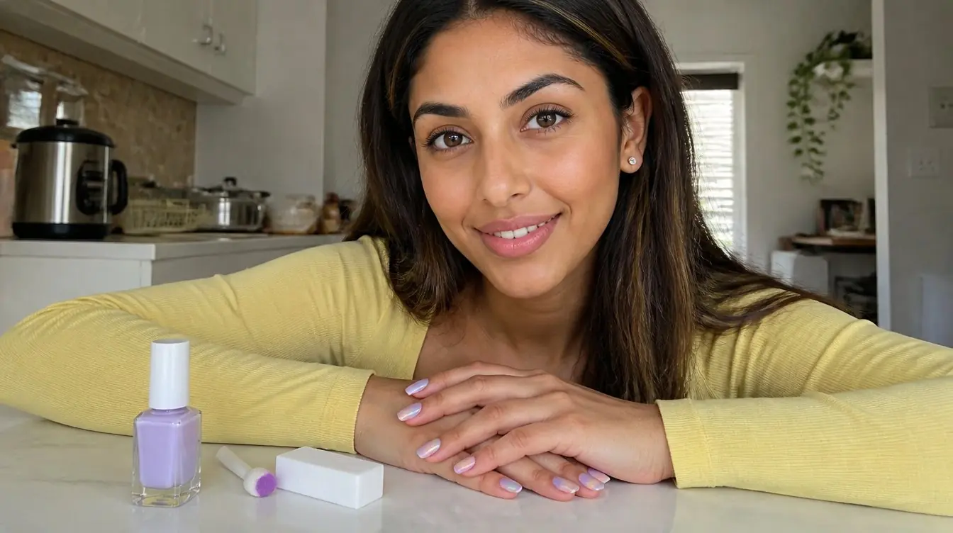 Kaira illustrating aura nail art in a candid home photograph